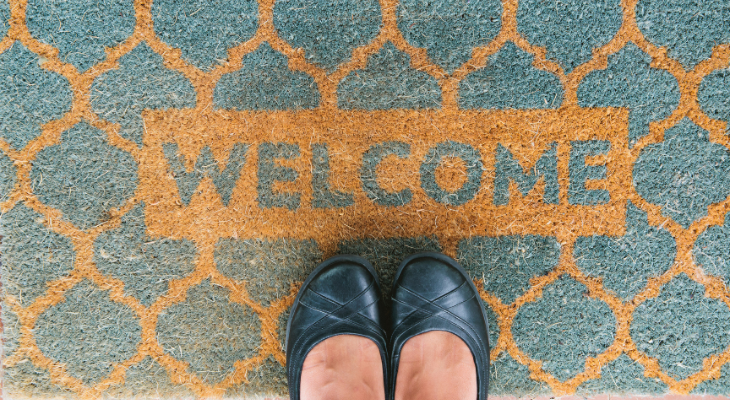 Welcome mat on front porch